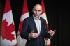 Health Minister Jean-Yves Duclos speaks to the media in Hamilton, Ont., during the Liberal Cabinet retreat, on Monday, Jan. 23, 2023. The federal government says in a news release it has signed an agreement in principle with Manitoba to invest more than $6.7 billion in the province's health-care system over 10 years. THE CANADIAN PRESS/Nick Iwanyshyn