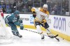 Nashville Predators right wing Nino Niederreiter (22) skates with the puck against San Jose Sharks defenseman Marc-Edouard Vlasic (44) during the first period of an NHL hockey game Thursday, Feb. 23, 2023, in San Jose, Calif. THE CANADIAN PRESS/AP-Darren Yamashita