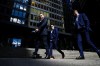 A group of men walk in the financial district in Toronto on Wednesday, September 29, 2021. A new survey suggests Canadian men are almost twice as likely as women to think gender inequality is being 