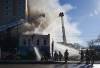 DAVID LIPNOWSKI / WINNIPEG FREE PRESS
                                The two-storey building at 813 Main St. is the fourth to burn in less than a block radius in recent weeks.