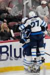 REBECCA BLACKWELL / THE ASSOCIATED PRESS
                                Winnipeg Jets players celebrate the game-winning goal against the Florida Panthers, scored during overtime of an NHL hockey game, Saturday, March 11, 2023, in Sunrise, Fla. The Winnipeg Jets defeated the Florida Panthers 5-4 in overtime.