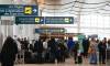 JOHN WOODS / WINNIPEG FREE PRESS Travellers gather at Winnipegճ airport as they try to board flights out of town Sunday, December 25, 2022. Air companies have been struggling with delays and cancellations due to weather. Re: Abas