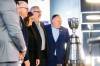 MIKAELA MACKENZIE / WINNIPEG FREE PRESS
                                President and CEO of the Winnipeg Football Club Wade Miller and other dignitaries pose for a photo with the Grey Cup at a press conference in Winnipeg on Tuesday announcing the 2025 Grey Cup will be held at IG Field.