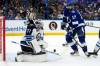 Chris O&rsquo;Meara / The Associated Press files
                                Jets goaltender Connor Hellebuyck makes a save in the Jets&rsquo; 3-2 victory over Tampa Bay as Lightning left-wing Alex Killorn looks for a rebound March 12, in Tampa, Fla.