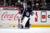 MARCIO JOSE SANCHEZ / THE ASSOCIATED PRESS
                                Winnipeg Jets goaltender Connor Hellebuyck gives up a goal on a shot from Los Angeles Kings defenseman Drew Doughty during the third period of an NHL hockey game Saturday in Los Angeles.