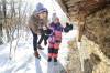 RUTH BONNEVILLE / WINNIPEG FREE PRESS
                                Penelope Heil hangs out at Fort Whyte with her dad, Bill, picking icicles off the sod hut Tuesday.