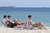 Airports and airlines are preparing for a surge in passengers ahead of spring break. Beachgoers face the sun on Fort Lauderdale beach, Thursday, Dec. 22, 2022, in Fort Lauderdale, Fla. THE CANADIAN PRESS/AP-Marta Lavandier