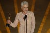 Jamie Lee Curtis accepts the award for best performance by an actress in a supporting role for 