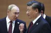FILE - Russian President Vladimir Putin, left, gestures while speaking to Chinese President Xi Jinping during the Shanghai Cooperation Organization (SCO) summit in Samarkand, Uzbekistan, Sept. 16, 2022. China said Friday, March 17, 2023, President Xi will visit Russia from Monday, March 20, to Wednesday, March 22, 2023, in an apparent show of support for Russian President Putin amid sharpening east-west tensions over the conflict in Ukraine. (Sergei Bobylev, Sputnik, Kremlin Pool Photo via AP, File)