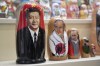 Russian matryoshka dolls with portraits of the Chinese President Xi Jinping, left, and Russian President Vladimir Putin are displayed among others for sale at a souvenir shop in Moscow, Russia, Tuesday, March 21, 2023. Chinese President Xi Jinping arrived in neighbouring Russia for a three-day trip for the talks with Russian President Vladimir Putin. (AP Photo/Dmitry Serebryakov)
