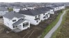 In this photo taken using a drone, homes under construction are seen in a new suburb, Friday, Oct. 15, 2021 in Ottawa. First proposed in the federal government's 2022 budget, the Tax-Free First Home Savings Account comes into force April 1, allowing prospective homebuyers who have never owned a home to save up to $40,000 on a tax-free basis. THE CANADIAN PRESS/Adrian Wyld