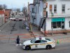 Police tape cordons off the scene after a Quebec provincial police officer was killed while trying to arrest a man in Louiseville, Que., Tuesday, March 28, 2023. THE CANADIAN PRESS/Ryan Remiorz