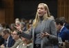 Sport Minister Pascale St-Onge rises during Question Period in Ottawa, Monday, March 20, 2023. The Canadian government committed $13.8 million in Tuesday's budget to addressing safe sport issues that have dominated headlines over the last year. THE CANADIAN PRESS/Adrian Wyld