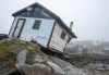 Workers start to clean up the devastation left by Hurricane Fiona in Burnt Island, N.L. on Wednesday Sept. 28, 2022. The federal government committed $31.7 million over three years in its latest budget to a low-cost flood insurance program. THE&nbsp;CANADIAN PRESS/Frank Gunn