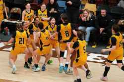 The Dakota Lancers celebrate their Manitoba High School 2023 AAAA Provincial Basketball Championship win over the Garden City Gophers Monday.