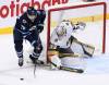 Winnipeg Jets’ Blake Wheeler (26) looks to pass the puck in front of Vegas Golden Knights goaltender Adin Hill (33) during third period NHL action in Winnipeg last year. (The Canadian Press files / Fred Greenslade)