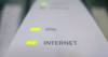 A parliamentary committee studying Canada&rsquo;s slumping media industry will reportedly call for a five per cent tax on broadband Internet services to boost a sector struggling to adapt to technological changes and evolving consumer habits. Function lights are illuminated on a modem in Chelsea, Que., July 11, 2011. THE CANADIAN PRESS/Adrian Wyld