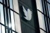 FILE - A Twitter logo hangs outside the company's offices in San Francisco, Dec. 19, 2022. Service alerts for subways, commuter trains and buses in New York City were back on Twitter, Thursday, May 4, 2023, a week after transit officials balked at paying the platform for access. (AP Photo/Jeff Chiu, File)