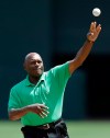 FILE - Former Oakland Athletics pitcher Vida Blue throws out the ceremonial first pitch prior to the baseball game against the Los Angeles Angels, July 27, 2013, in Oakland, Calif. Blue, a hard-throwing left-hander who became one of baseball's biggest draws in the early 1970 and helped lead brash Oakland Athletics to three straight World Series titles, has died. He was 73. The A's said Blue died Saturday, May 6, 2023 even but did not give a cause of death. (AP Photo/Ben Margot, file)