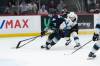 BROOK JONES / WINNIPEG FREE PRESS
                                Winnipeg Ice defenceman Ben Zloty tries to contain Seattle Thunderbirds centre Dylan Guenther Friday night during third-period action.