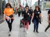 JESSICA LEE / WINNIPEG FREE PRESS
                                Cindy Porsche (from left), Brenda Jones and Bonnie Leslie walk with their patrol group along Portage Avenue, handing out water and snacks.