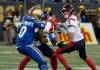 ETHAN CAIRNS / WINNIPEG FREE PRESS FILES
                                Winnipeg Blue Bombers&rsquo; Malik Clements (0) attempts to tackle Montreal Alouettes&rsquo; quarterback Trevor Harris (7) in the second half of their CFL game in Winnipeg in 2022.