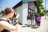 Mike Deal / Winnipeg Free Press
                                Students from left: Elissa Guimond, Logan Harvey, Erica Guimond, Orlando Harper, and Kirklynn Harper get their photo taken by Alana Ollinger community organizer at CEDA, during the opening ceremony for Niiwin Minisiwiwag school, located at 383 Selkrik Avenue.