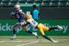Jason Franson / THE CANADIAN PRESS
                                Bombers receiver Kenny Lawler breaks free from a tackle by Edmonton Elks&rsquo; Dwayne Thompson II Saturday during a CFL exhibition game in Edmonton.