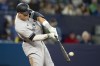 New York Yankees Aaron Judge hits his second homerun of the game during eighth inning AL action against the Toronto Blue Jays in Toronto on Monday May 15, 2023. Blue Jays manager John Schneider said the team talked to Major League Baseball officials on Tuesday about the positioning of New York's base coaches on the field during play. THE CANADIAN PRESS/Frank Gunn