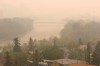 Heavy smoke from northern Alberta forest fires comes south to blanket the Bow River area in downtown Calgary, Tuesday May 16, 2023. Air quality statements continue to blanket much of British Columbia and the Prairie provinces as scores of wildfires rage.THE CANADIAN PRESS/Larry MacDougal
