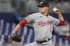 Washington Nationals starting pitcher MacKenzie Gore (1) aims a pitch during the second inning of a baseball game against the Miami Marlins, Wednesday, May 17, 2023, in Miami. (AP Photo/Marta Lavandier)