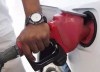Experts say a shifting group of factors including wildfires in Alberta, a slowing economy and potential pressures on supply will all have an effect on gas prices as the long weekend heralds the start of the summer. A person pumps fuel in Toronto on Wednesday, September 12, 2012. THE CANADIAN PRESS/Michelle Siu