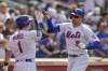 New York Mets' Brandon Nimmo (9) celebrates his solo home run in the seventh inning of a baseball game against the Cleveland Guardians, Sunday, May 21, 2023, in New York. (AP Photo/John Minchillo)