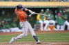 Houston Astros' Jake Meyers hits a three-run home run during the fourth inning of a baseball game against the Oakland Athletics in Oakland, Calif., Sunday, May 28, 2023. (AP Photo/Jeff Chiu)