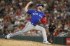 Toronto Blue Jays relief pitcher Anthony Bass throws to a Minnesota Twins batter during the ninth inning of a baseball game Thursday, Aug. 4, 2022, in Minneapolis. Blue Jays reliever Bass says he's sorry for sharing a homophobic social media post. Bass spoke ahead of Toronto's game against the Milwaukee Brewers tonight. THE CANADIAN PRESS/AP/Bruce Kluckhohn