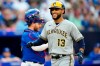 Milwaukee Brewers' Abraham Toro (13) celebrates his two-run home run against the Toronto Blue Jays during second inning MLB baseball action in Toronto on Wednesday, May 31, 2023.THE CANADIAN PRESS/Frank Gunn