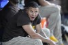 San Diego Padres' Manny Machado looks out of the dugout during the eighth inning of a baseball game against the Miami Marlins, Thursday, June 1, 2023, in Miami. (AP Photo/Wilfredo Lee)