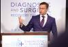 Dr. Ed Buchel, surgical lead on the wait time task force steering committee, speaks to media in April. (Ruth Bonneville / Winnipeg Free Press files)