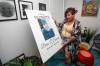 JOHN WOODS / WINNIPEG FREE PRESS
                                Lise Leveille, widow of Denis L&rsquo;Heureux who was killed when his motorcycle hit wet mud on a highway last year, is photographed in a memorial area for L&rsquo;Heureux in her Winnipeg home.