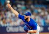 Toronto Blue Jays relief pitcher Anthony Bass (52) works against the Milwaukee Brewers during ninth inning MLB baseball action in Toronto on Wednesday, May 31, 2023. Bass has been designated for assignment by the Toronto Blue Jays. THE CANADIAN PRESS/Frank Gunn