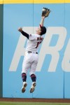 Cleveland Guardians right fielder Will Brennan makes a leaping catch to get out Houston Astros' Alex Bregman during the third inning of a baseball game, Friday, June 9, 2023, in Cleveland. (AP Photo/Ron Schwane)