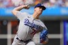 Los Angeles Dodgers' Bobby Miller pitches during the first inning of a baseball against the Philadelphia Phillies, Saturday, June 10, 2023, in Philadelphia. (AP Photo/Matt Rourke)