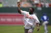 Baltimore Ravens linebacker Roquan Smith throws a ceremonial first pitch before a baseball game between the Baltimore Orioles and the Kansas City Royals at Oriole Park at Camden Yards, Sunday, June 11, 2023, in Baltimore. (AP Photo/Jess Rapfogel)