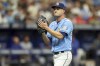 Tampa Bay Rays starting pitcher Shane McClanahan celebrates at the end of the seventh inning against the Texas Rangers in a baseball game, Sunday, June 11, 2023, in St. Petersburg, Fla. The Rays won 7-3. (AP Photo/Mike Carlson)
