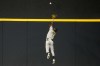 Oakland Athletics' Esteury Ruiz makes a leaping catch on a ball hit by Milwaukee Brewers' Brian Anderson during the fourth inning of a baseball game Sunday, June 11, 2023, in Milwaukee. (AP Photo/Morry Gash)