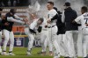 Detroit Tigers' Spencer Torkelson, center, is celebrated by teammates after the 10th inning of a baseball game against the Atlanta Braves, Monday, June 12, 2023, in Detroit. Torkelson hit the walk-off single to center to score Andy Ibanez. (AP Photo/Carlos Osorio)