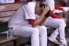 St. Louis Cardinals relief pitcher Giovanny Gallegos sits in the dugout after giving up a two-run home run to San Francisco Giants' Mike Yastrzemski during the ninth inning of a baseball game Wednesday, June 14, 2023, in St. Louis. (AP Photo/Jeff Roberson)