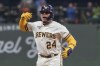Milwaukee Brewers' William Contreras reacts after hitting a two-run scoring double during the seventh inning of a baseball game against the Arizona Diamondbacks Tuesday, June 20, 2023, in Milwaukee. (AP Photo/Morry Gash)