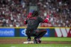 Cincinnati Reds' Elly De La Cruz gestures to the crowd as the Atlanta Braves change pitchers during the sixth inning of a baseball game in Cincinnati, Friday, June 23, 2023. (AP Photo/Aaron Doster)