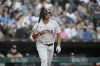 Boston Red Sox's Rafael Devers flips his bat as he watches his two-run home run off Chicago White Sox starting pitcher Lucas Giolito during the fourth inning of a baseball game Friday, June 23, 2023, in Chicago. (AP Photo/Charles Rex Arbogast)